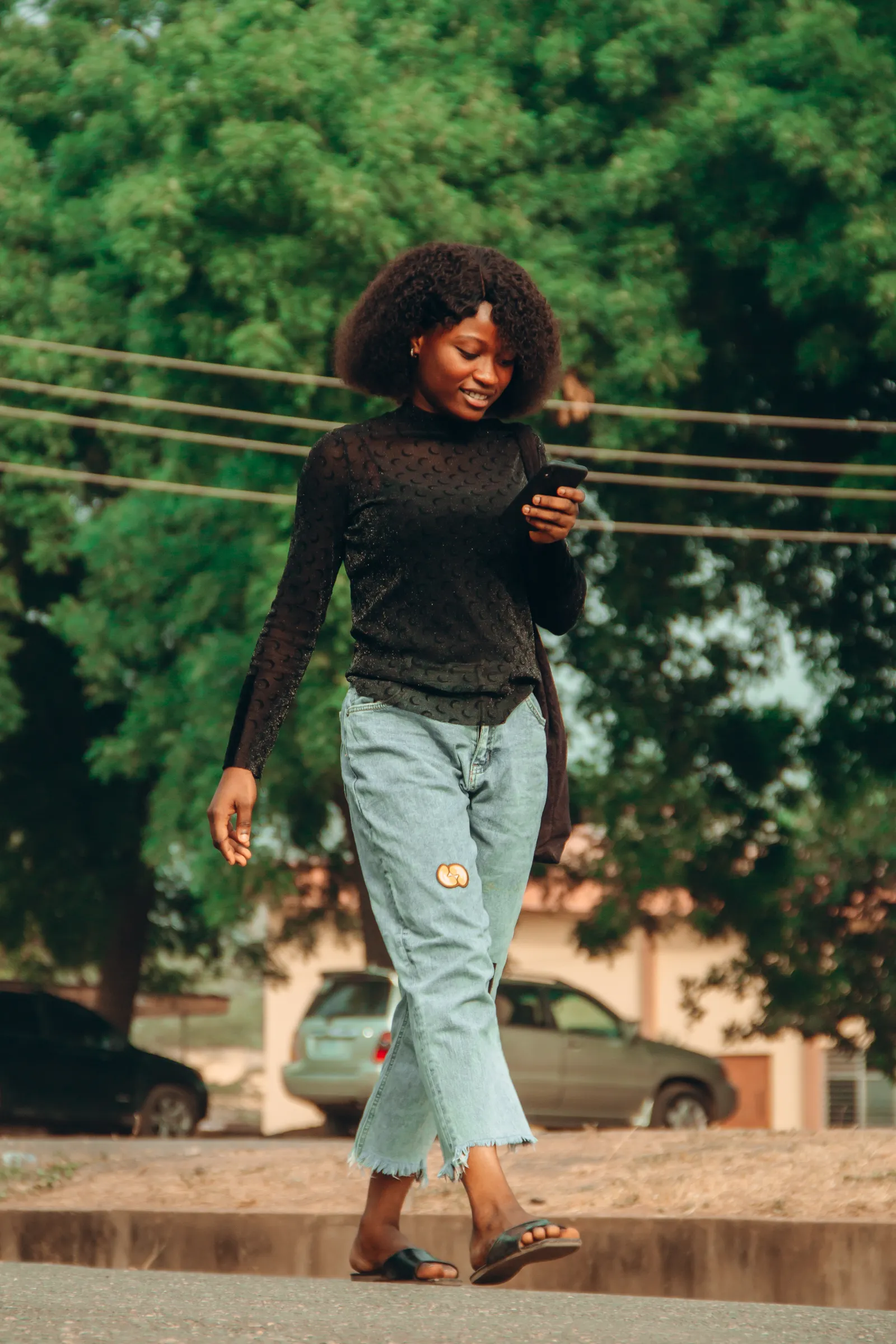 People using a smartphone in a real-life setting related to Transfers